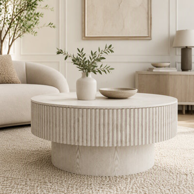 Table basse ronde avec rangement dissimulé