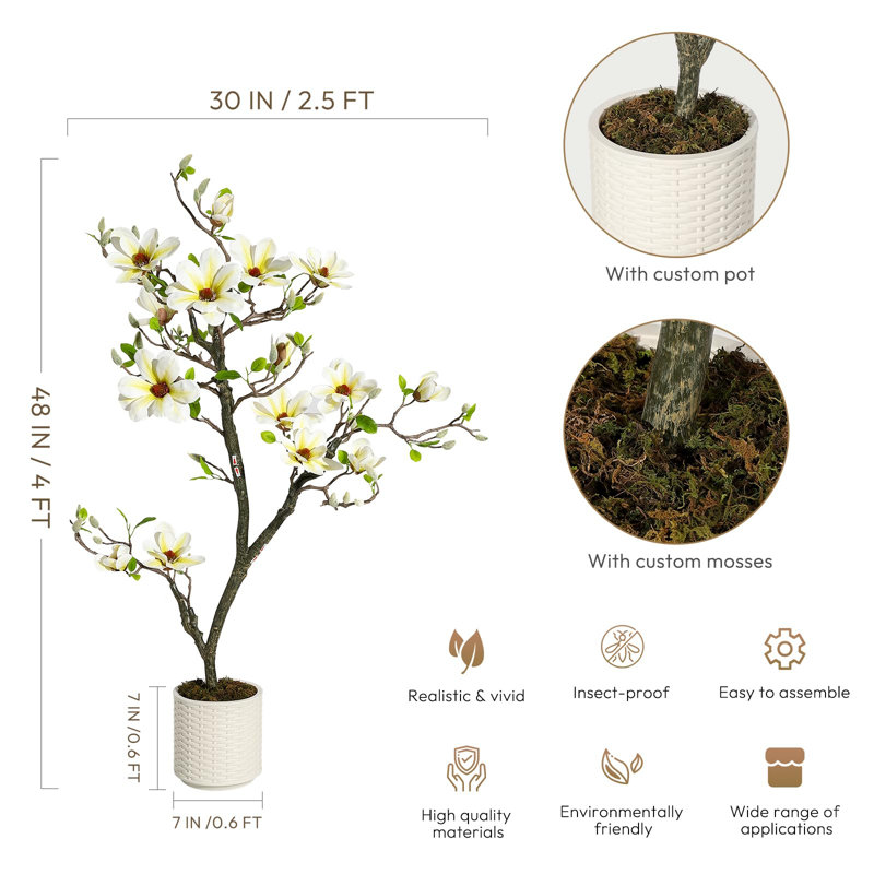 Magnolia artificiel avec des fleurs blanches réalistes et des feuilles vertes luxuriantes