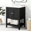 Meuble-lavabo moderne noir avec tablette ouverte et lavabo en céramique