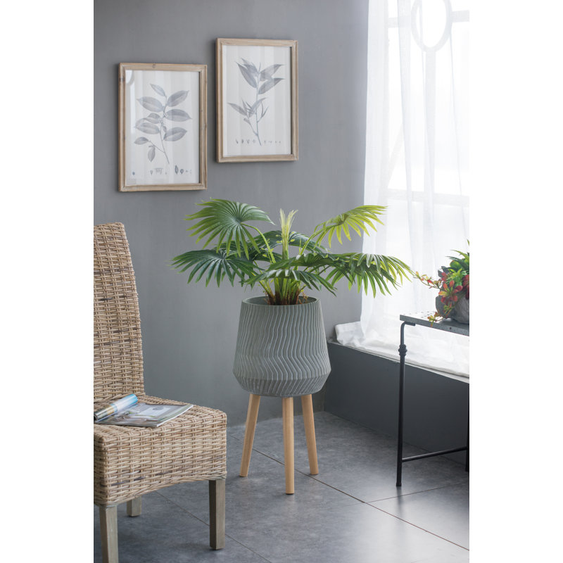 Pot à fleurs surélevé en ciment