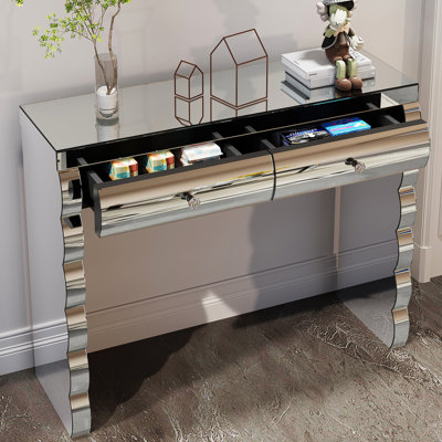 Console moderne en argent avec miroir incurvé au four et deux espaces de rangement, surface réfléchissante pour une sensation ouverte, miroir à structure avec tiroirs latéraux lustrés, couloir ou salon facile à assembler