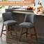 Ensemble de tabourets de bar pivotants rembourrés de 2 chaises modernes de 26 po à hauteur de comptoir avec design ergonomique, structure en bois et repose-pieds réglable