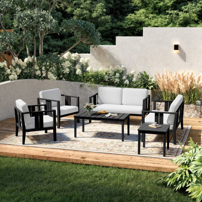 Ensemble de patio extérieur en teck pour six personnes avec coussins et deux tables Polett