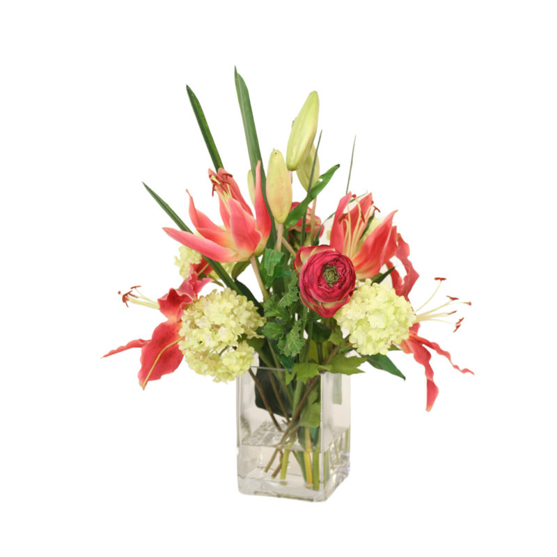 Renoncule avec lys et boules de neige dans un vase rectangulaire