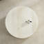 Table basse en faux travertin avec motif en relief accrocheur