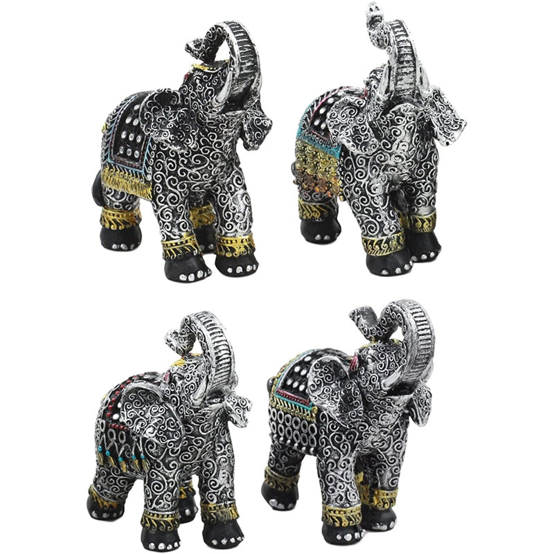 Ensemble de 4 figurines d'éléphant décorées