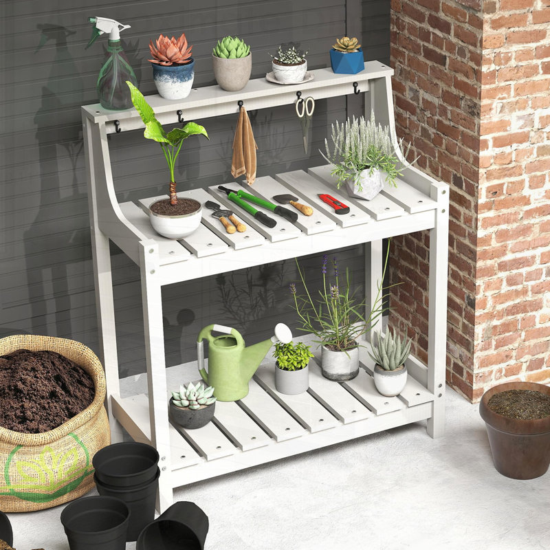 Table de rempotage durable en PEHD avec rangement, pour une utilisation extérieure toutes saisons dans le patio et la cour