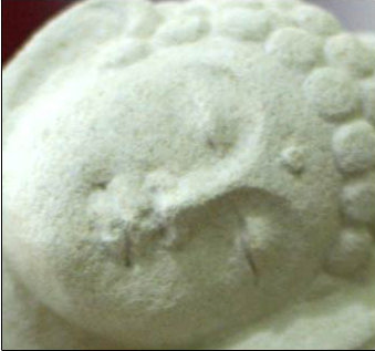 Buddha's Blissful Sleep Sandstone Figurine