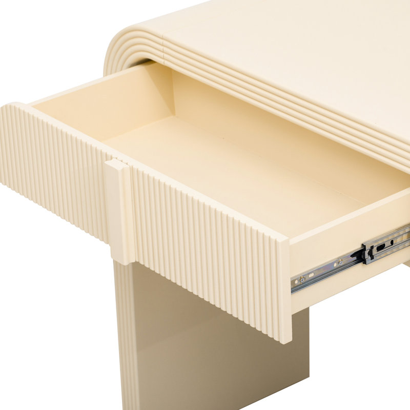 Console brillante couleur crème abricot avec tiroir, silhouette arrondie