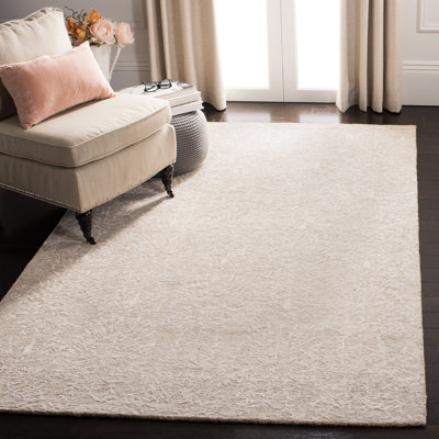 Tapis floral ivoire / beige en laine touffeté à la main Authneil