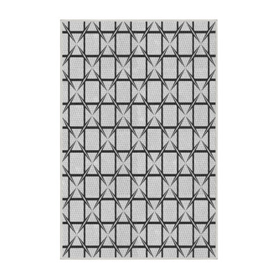 Tapis gris/crème tissé à la machine