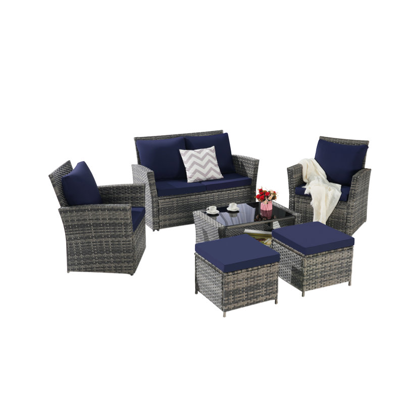 Ensemble de meubles de patio en osier 6 pièces avec repose-pieds et table basse en verre trempé, Bleu très foncé