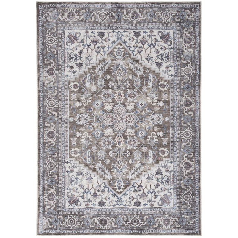 Tapis ivoire et bleu à motif floral délavé 6 pi x 9 pi