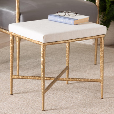 Repose-pieds Baxton Studio Fumiye - tabouret d'appoint rustique moderne avec structure en métal forgé à la main et siège rembourré pour salon ou salon