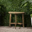 Table en bois, grise, demi-ronde, pliable pour faciliter le transport et demi-ronde