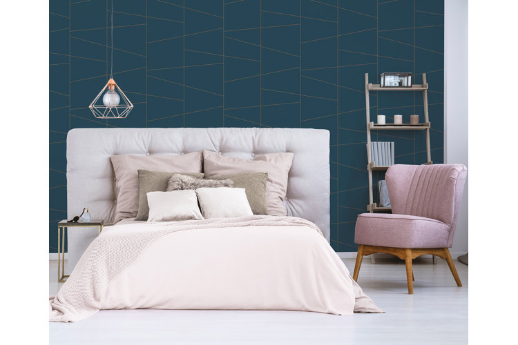 Bedroom with geometric wallpaper