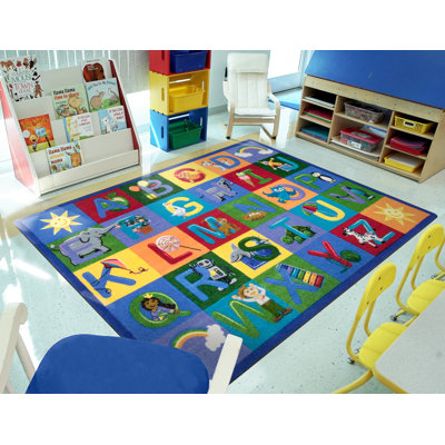 Tapis géométrique touffeté vert / bleu / jaune