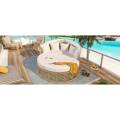 Lit de jour rond en rotin d'extérieur avec auvent rétractable, canapé de piscine rond en osier avec coussins amovibles