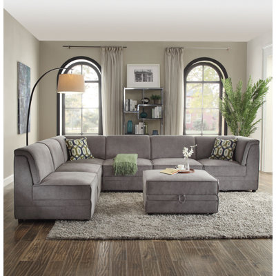 Canapé modulaire contemporain avec rangement et repose-pieds Erskine