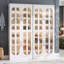 Armoire de rangement pour chaussures avec 6 modes d'éclairage et organisateur de chaussures autoportant moderne en acrylique à DEL à intensité variable