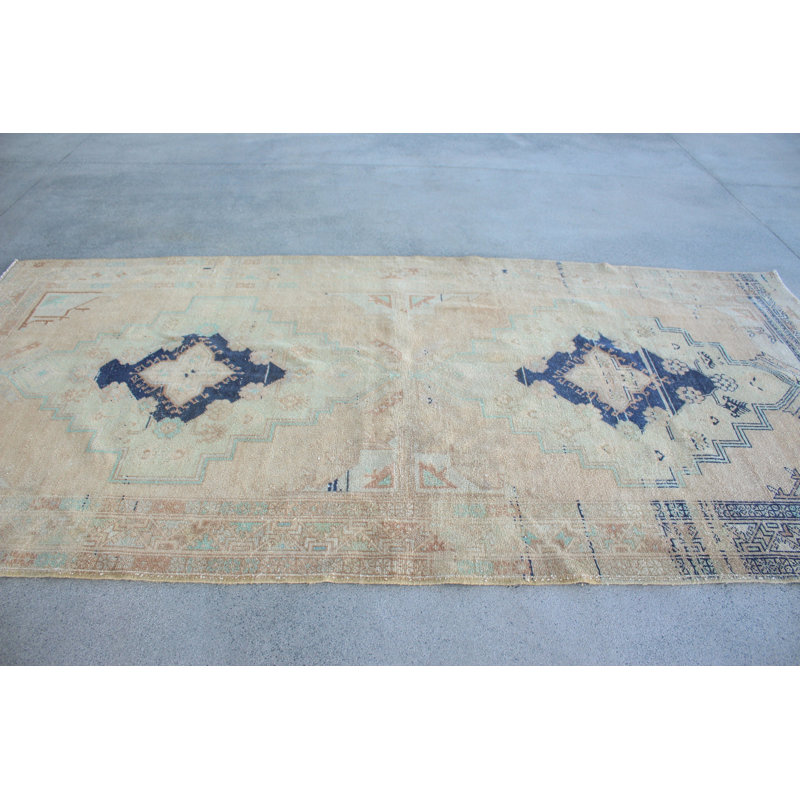 Grand tapis turc rétro beige pour une touche luxueuse dans votre salon ou votre salon