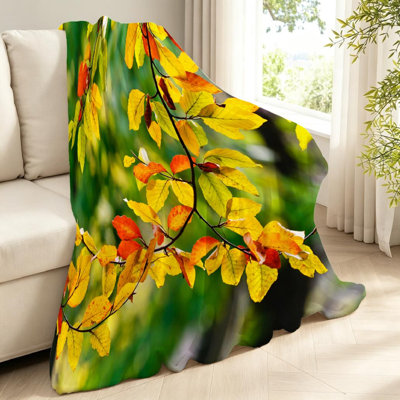 Jeté en flanelle dorée ultra douce en molleton, feuilles de couleurs vives sur un seul côté