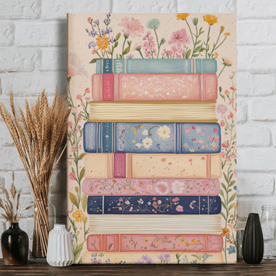 Pile de livres ornés de motifs floraux sur toile