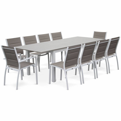 Woodcliff 8 - Person Patio Dining Set with Extendable Rectangular Table