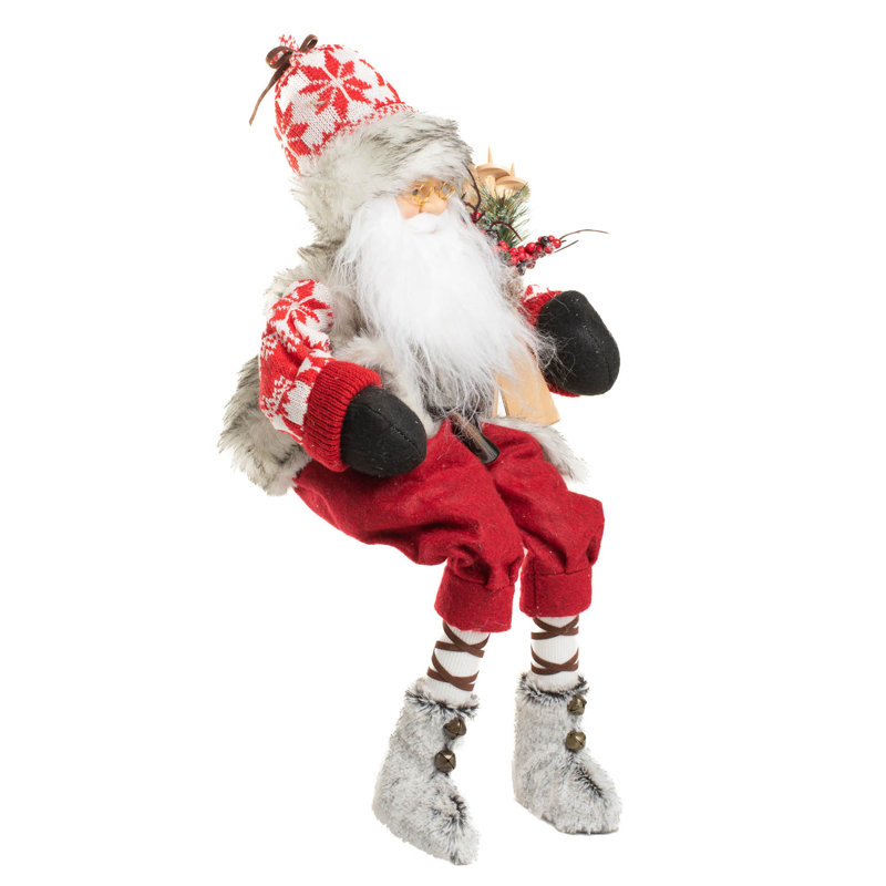 Père Noël alpin assis rouge