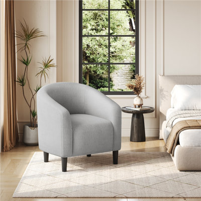 Fauteuil club rembourré en tissu