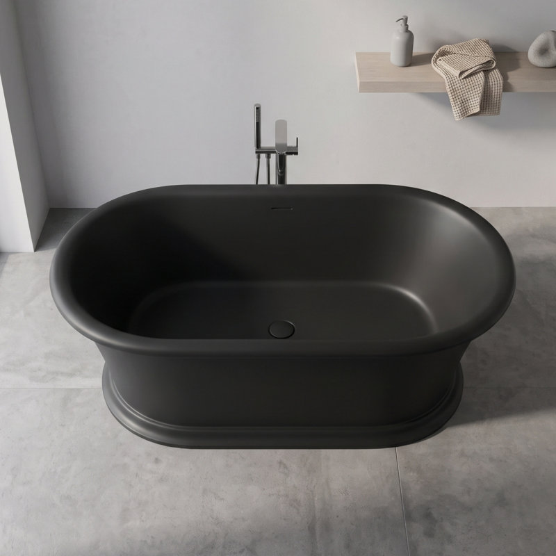Baignoire autoportante de 155 cm (61 po) en surface solide avec base cannelée d'inspiration romaine, résine de pierre noire mat