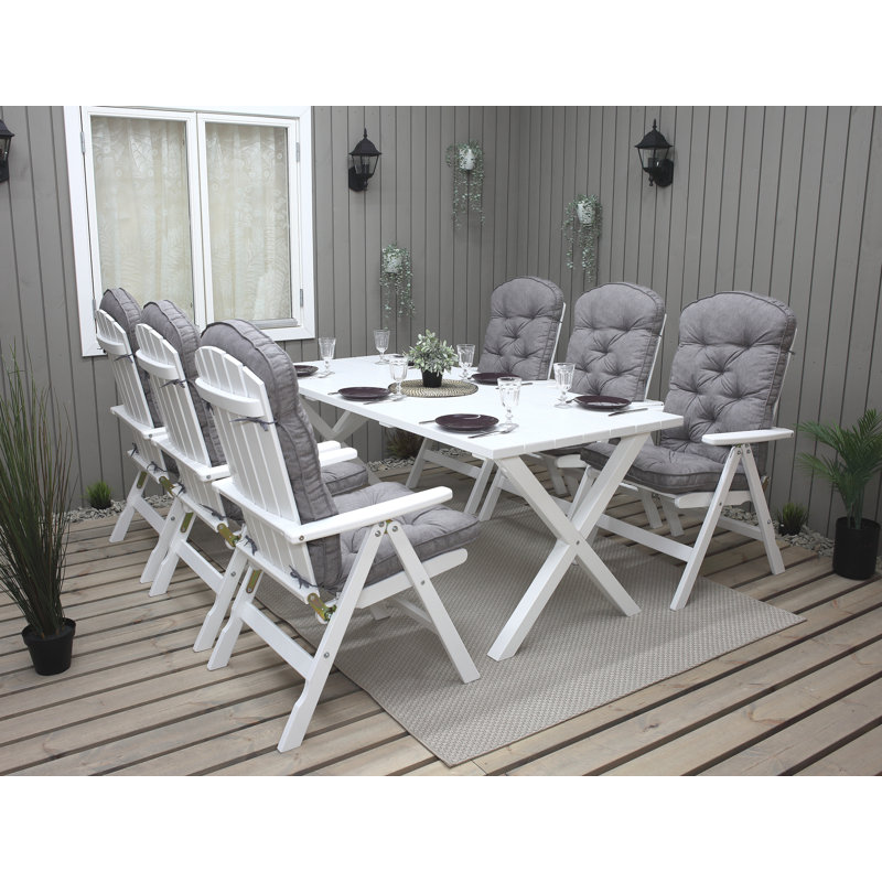 Capuano 6 - Person Wood Patio Dining Set with Rectangular Table , Cushions Included