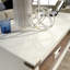 Table basse à plateau relevable, finition brune