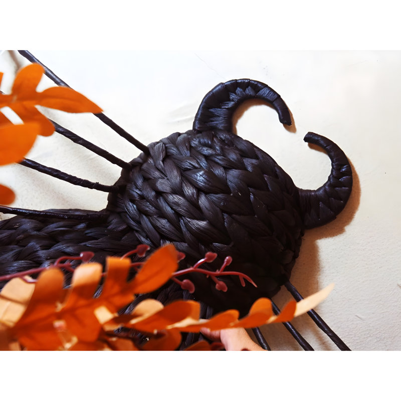 Ensemble de 2 décorations murales en araignée noire tissée à la main avec détail de corne enroulée - Art d'Halloween