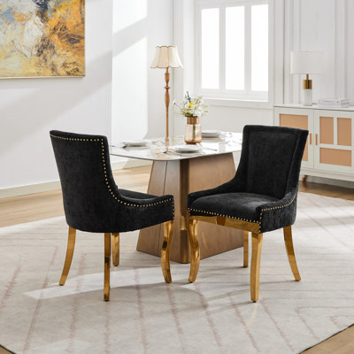 Chaises de salle à manger en chenille noire dans un style moderne, de 2 avec mousse et ressorts de haute qualité, élégantes garnitures courbées dorées pour une ambiance luxueuse