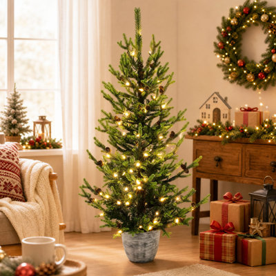 Sapin de Noël artificiel réaliste de 1,20 m (4 pi) en épicéa vert préilluminé avec pommes de pin, lumières DEL blanc chaud et pot argenté