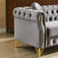 Canapé Chesterfield en velours avec coussins ronds