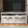 Perrault 4 Door TV Stand for TVs up to 75" with Open Storage