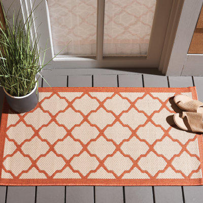 Tapis intérieur / extérieur à motif géométrique beige / orange Bordeaux