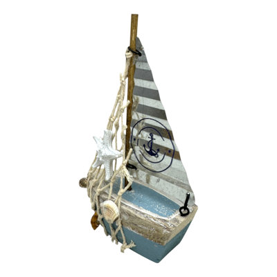 Sailboat With Net And Shells Figurine