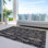 Tapis intérieur / extérieur noir lavable à la machine Xhevrie
