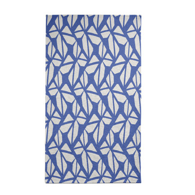 Tapis décoratif bleu géométrique