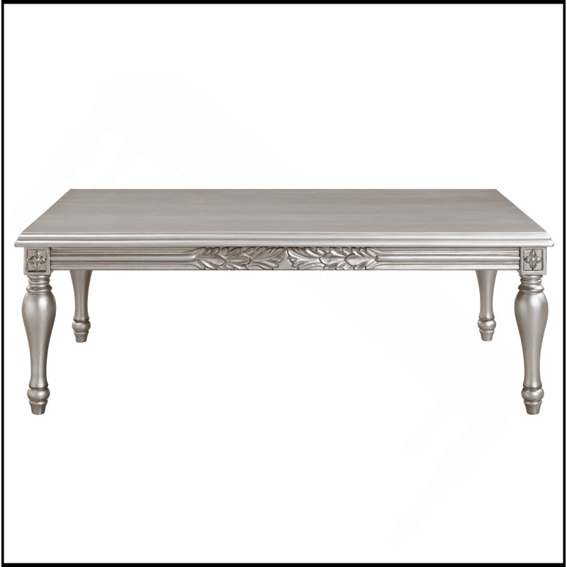 Table basse Platinum avec bordure florale complexe et pieds tournés classiques