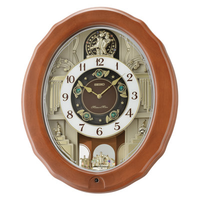 Emerald Pageant Melodies in Motion Wall Clock