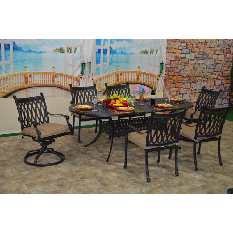 Lebrun 6 - Person Patio Dining Set with Oval Table , Sunbrella® Cushions Included