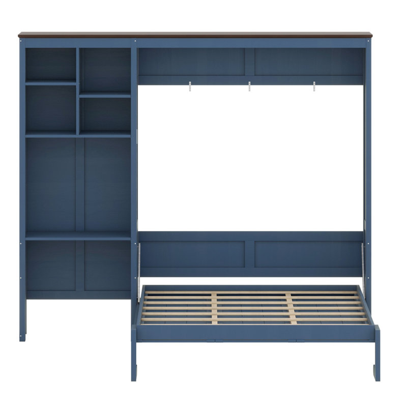 Un lit escamotable avec bureau intégré et armoire de rangement libère de l'espace au sol dans les studios et les chambres d'hôtes.