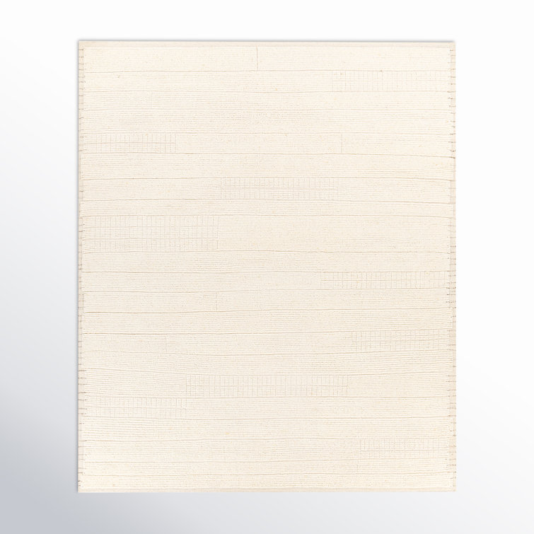 Gitte Solid Color Handmade Wool Area Rug in Ivory