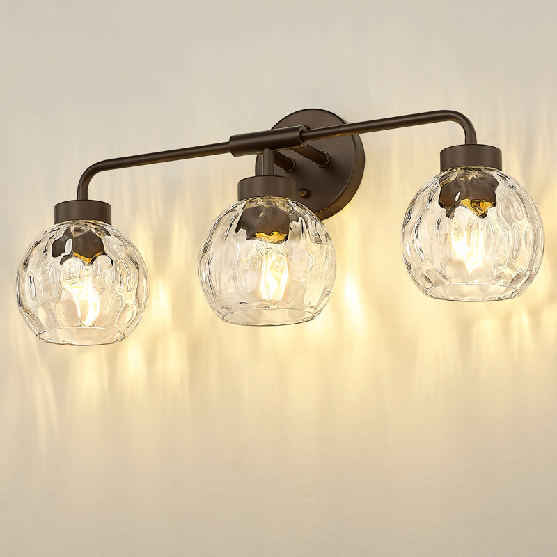 Éclairage pour salle de bain 3 lumières avec globe en verre ondulé, bronze huilé, H 9,5 po x l 23,1 po x P 6,9 po
