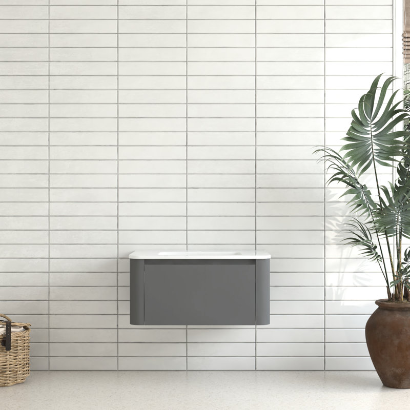 Meuble-lavabo mural de 30 po de couleur grise avec lavabo en céramique blanche sans couture, conception flottante élégante, 45 poignées en angle, tiroir à fermeture en douceur, finition usée, espace de rangement spacieux, style européen intégré