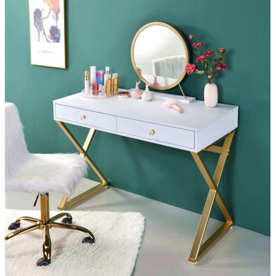 Bureau de coiffeuse à finition dorée avec miroir et plateau à bijoux